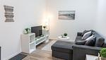 Sofaecke mit TV - Ferienwohnung Amrum auf dem Holmhof - Top-Hundeurlaub