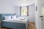 Gemütliches Schlafzimmer mit Doppelbett - Boddenräuber 1 - Top-Hundeurlaub
