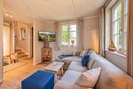 Wohnzimmer - Ferienhaus Herrlichkeit 01 Feriendorf Klein Stresow Rügen - Top-Hundeurlaub