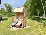 Gartenblick - Ferienhaus Herrlichkeit 01 Feriendorf Klein Stresow Rügen - Top-Hundeurlaub