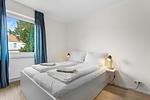 Schlafzimmer - Apartment Hope mit Balkon - Top-Hundeurlaub