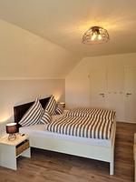 Schlafzimmer - Ferienhaus Naase App. 4 - Top-Hundeurlaub