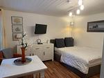 Wohnzimmer - Datscha Gartenhaus - Top-Hundeurlaub