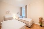 Schlafzimmer mit Einzelbett - Hus Inselkieker 110 - Top-Hundeurlaub