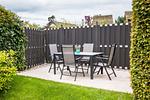 Terrasse mit Tisch und Stühlen im Garten - Haus Windflüchter - Top-Hundeurlaub