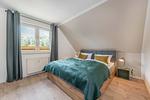Schlafzimmer - Ferienwohnung Dock 23 - Top-Hundeurlaub