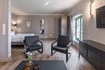 Ferienwohnung Heimathafen Klink - Wohnzimmer mit Couch und Sessel - Heimathafen - Top-Hundeurlaub