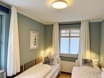 Schlafzimmer 2 mit zwei Einzelbetten - Hafenhäuser Breege -  Whg. 10 Boddenpfoten - Top-Hundeurlaub