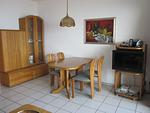 Wohnzimmer - Ferienwohnung C07 - Top-Hundeurlaub