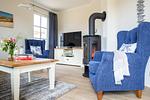 Wohnzimmer - Ferienhaus Schilfrohrsänger 43 - Top-Hundeurlaub