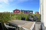 Terrasse mit Süd-West-Ausrichtung und Gartenmöbeln - Wohnung 04 - Top-Hundeurlaub