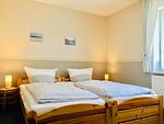 Schlafzimmer - Kavelweg 12 Wohnung Arkona - Top-Hundeurlaub
