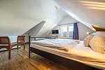 Schlafzimmer - Rosenberg 38 Uriges Reetdachhaus - Top-Hundeurlaub