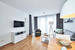 Wohn-Essbereich mit Zugang zum Balkon - Deichhäuser Anna Küste 4-24 - Top-Hundeurlaub