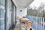 Überdachter Balkon mit Sitzgelegenheit - Deichhäuser Anna Küste 4-24 - Top-Hundeurlaub