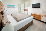 Schlafzimmer - Nordstrandperle Ap. O6 - Top-Hundeurlaub