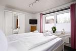 Schlafzimmer - Ferienwohnung Deich und Meer in Stein - Top-Hundeurlaub
