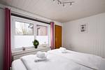 Schlafzimmer - Ferienwohnung Deich und Meer in Stein - Top-Hundeurlaub