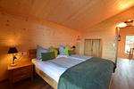 Schlafzimmer - Jägar Chalet - Feriendorf Via Claudia Haus 73 - Top-Hundeurlaub