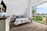 Schlafzimmer - Ferienhaus Treibholz Fehmarn - Top-Hundeurlaub
