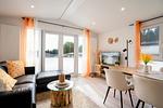 Wohnzimmer - Ferienhaus "Pier 99" (99) - Top-Hundeurlaub