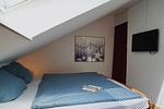 Schlafzimmer - Ferienhaus Strandflieder - Top-Hundeurlaub