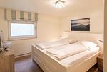 Schlafzimmer - Strandhaus Whg. 1 - Top-Hundeurlaub