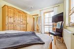 Kleiderschrank und TV im Schlafzimmer - Wohnung 4.4 - Seeschwalbe - Top-Hundeurlaub