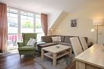 Wohnzimmer mit Blick von der Treppe - Wohnung 10-7 - Top-Hundeurlaub