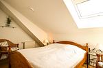 1. Schlafzimmer mit Doppelbett - Wohnung 10-7 - Top-Hundeurlaub