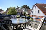 Balkon mit Gartenmöbeln - Wohnung 10-7 - Top-Hundeurlaub