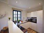 Küche / Küchenzeile - Premium Reetdachvilla mit 3 Schlafzimmern, Sauna und Kamin (F04) - Top-Hundeurlaub