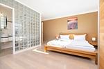 Schlafzimmer - FeWo Wellenspiel - Kamin, Sauna, Meerblick - Top-Hundeurlaub