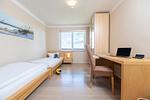 Schlafzimmer - FeWo Wellenspiel - Kamin, Sauna, Meerblick - Top-Hundeurlaub