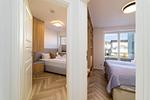 Schlafzimmer - FeWo Meerzeit - Balkon, Sauna, Meerblick - Top-Hundeurlaub