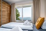 Schlafzimmer - FeWo Hafenliebe - Kamin, Sauna, Meerblick - Top-Hundeurlaub