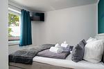 Schlafzimmer - FeWo Sonnenschein -  Kamin, Sauna, Meerblick - Top-Hundeurlaub