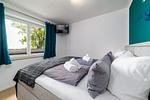 Schlafzimmer - FeWo Sonnenschein -  Kamin, Sauna, Meerblick - Top-Hundeurlaub
