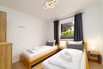 Schlafzimmer - FeWo Sonnenschein -  Kamin, Sauna, Meerblick - Top-Hundeurlaub