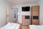 Schlafzimmer - FeWo Sonnenschein -  Kamin, Sauna, Meerblick - Top-Hundeurlaub