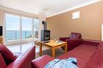 Wohnzimmer - FeWo Fontane - Kamin, Sauna, Meerblick, Badeteich - Top-Hundeurlaub