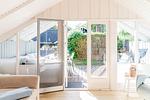 Wohnzimmer mit Zugang zur Terrasse - Lille Hus - Top-Hundeurlaub
