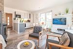 Wohnzimmer - Ferienhaus Glück unter Reet mit Sauna, Kamin und Terrasse - Top-Hundeurlaub