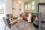 Kamin-/Ofen - Ferienhaus Glück unter Reet mit Sauna, Kamin und Terrasse - Top-Hundeurlaub