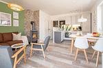 Wohnzimmer - Ferienhaus Glück unter Reet mit Sauna, Kamin und Terrasse - Top-Hundeurlaub