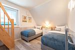 Schlafzimmer - Ferienhaus Glück unter Reet mit Sauna, Kamin und Terrasse - Top-Hundeurlaub