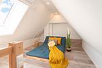 Schlafzimmer - Ferienhaus Glück unter Reet mit Sauna, Kamin und Terrasse - Top-Hundeurlaub