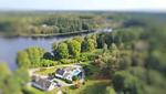 Luftaufnahme der Villa Waldsee – Ferienhaus mitten im Wald direkt am See in Vissefjärda - Villa Waldsee - Top-Hundeurlaub