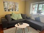 Wohnzimmer der Villa Waldsee – gemütlicher Wohnbereich im Ferienhaus direkt am See - Villa Waldsee - Top-Hundeurlaub