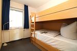 Schlafzimmer - Haus Ostseeallee 32b Fewo 1.2 - Top-Hundeurlaub